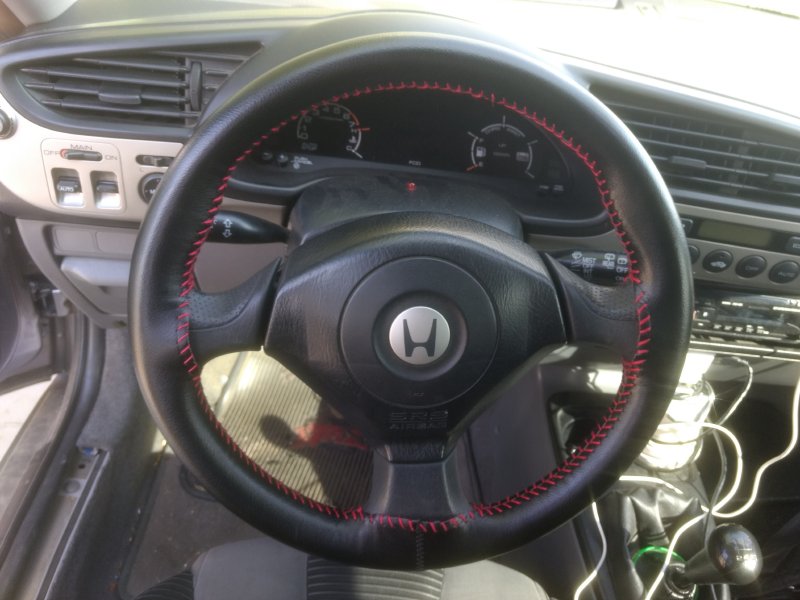 I wraped my steering wheel with leather. Honda Insight Forum